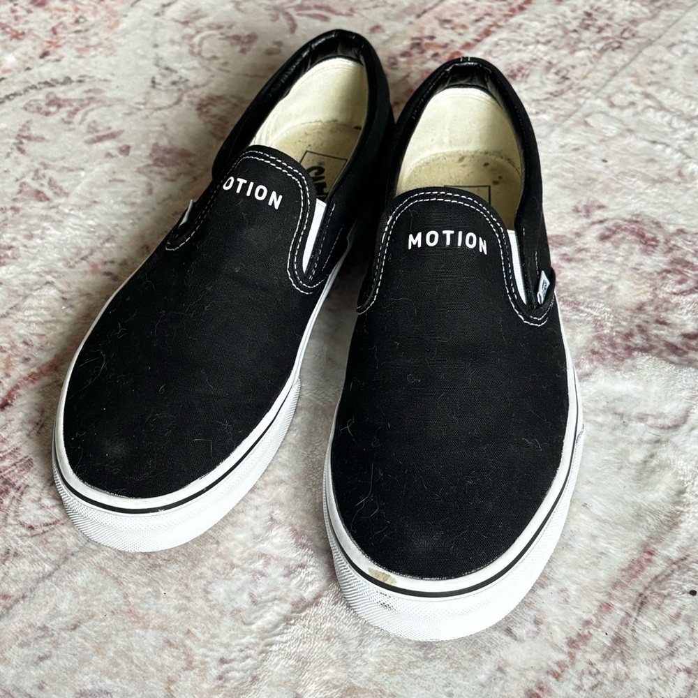 Vans Black and White Slip-On Sneakers